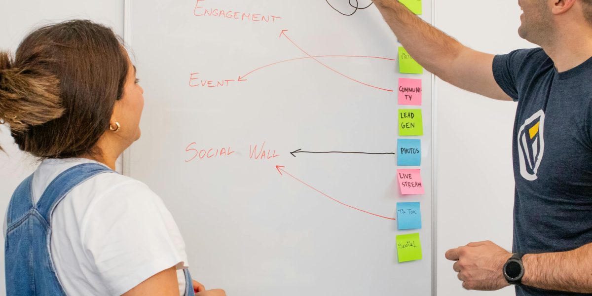 A team actively brainstorming, illustrating the application of mental models in a collaborative problem-solving setting.