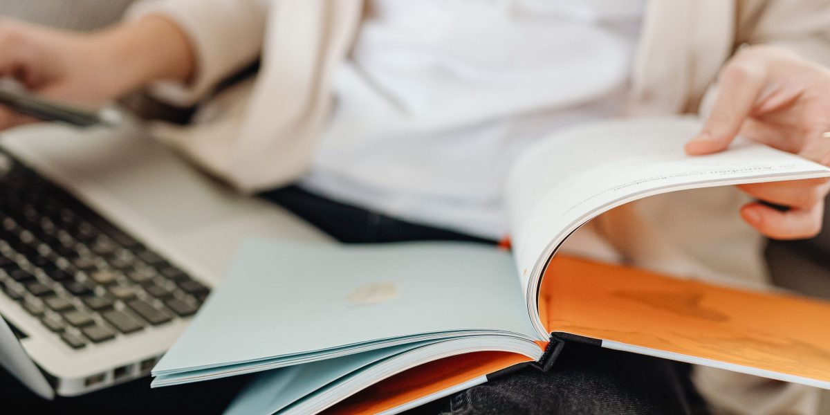 A person carefully exploring various online learning options, considering diverse perspectives.
