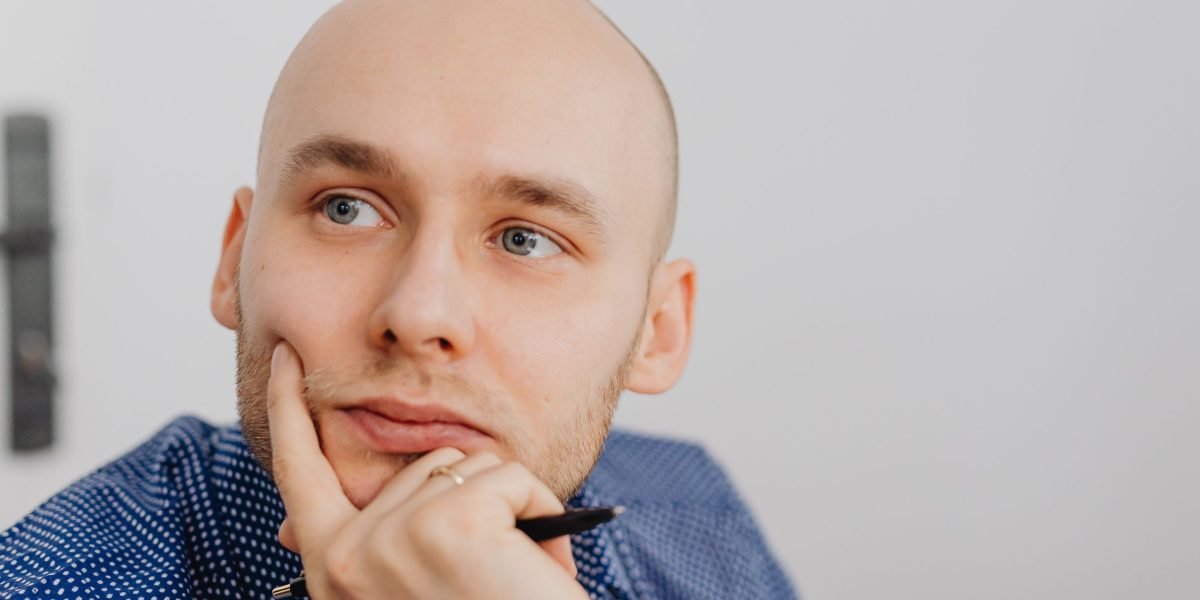 A person engrossed in thought, reflecting on new ideas or challenging concepts.