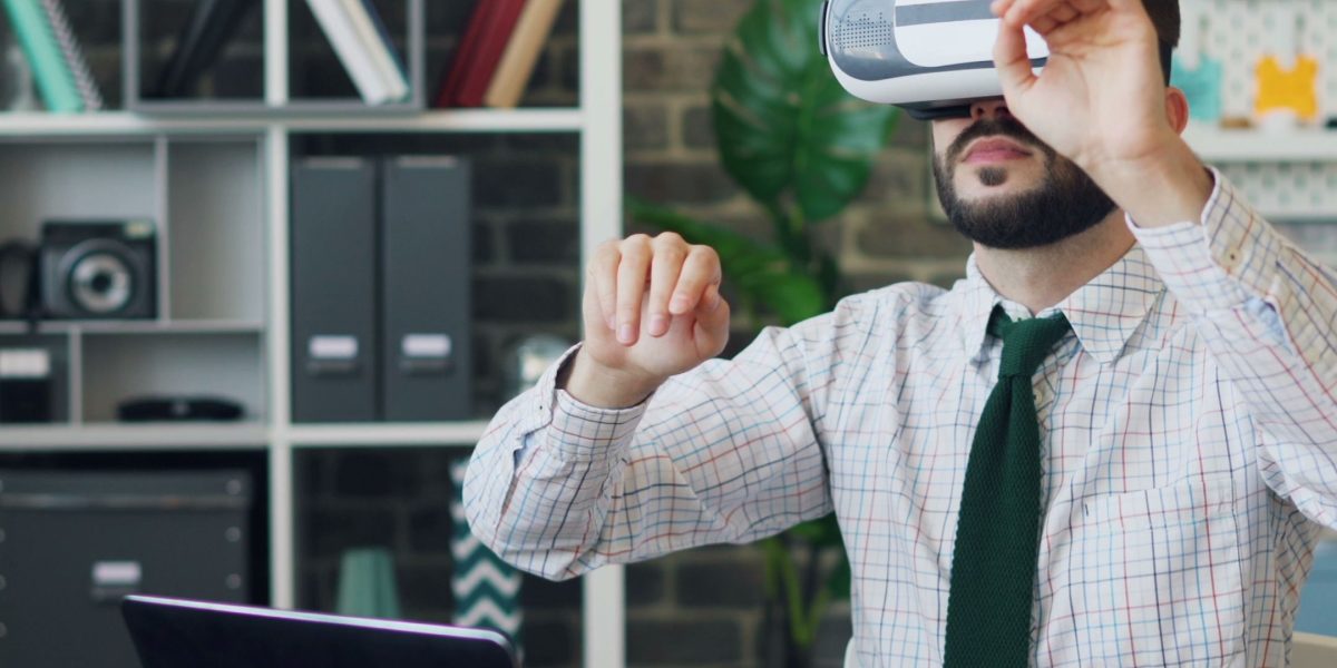 A worker is immersed in a virtual reality simulation, practicing critical safety decision-making in a realistic environment.