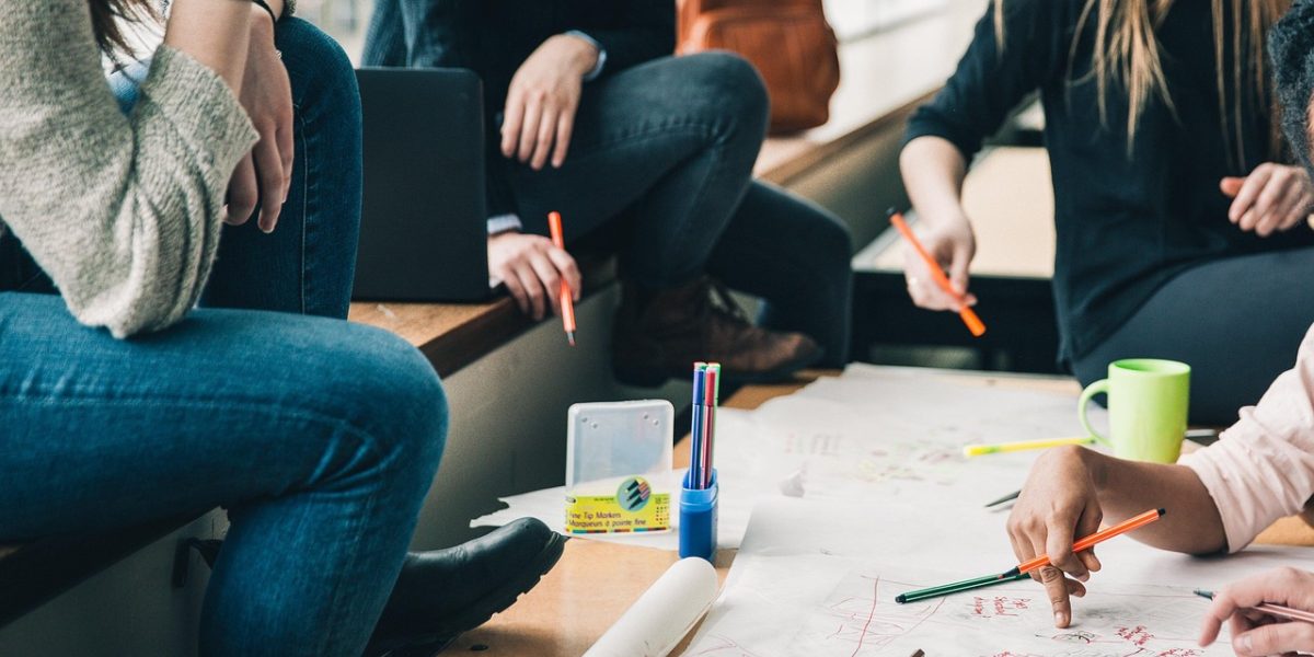 Students engage in a blended learning environment, seamlessly combining digital resources with in-person interaction for a dynamic educational experience.