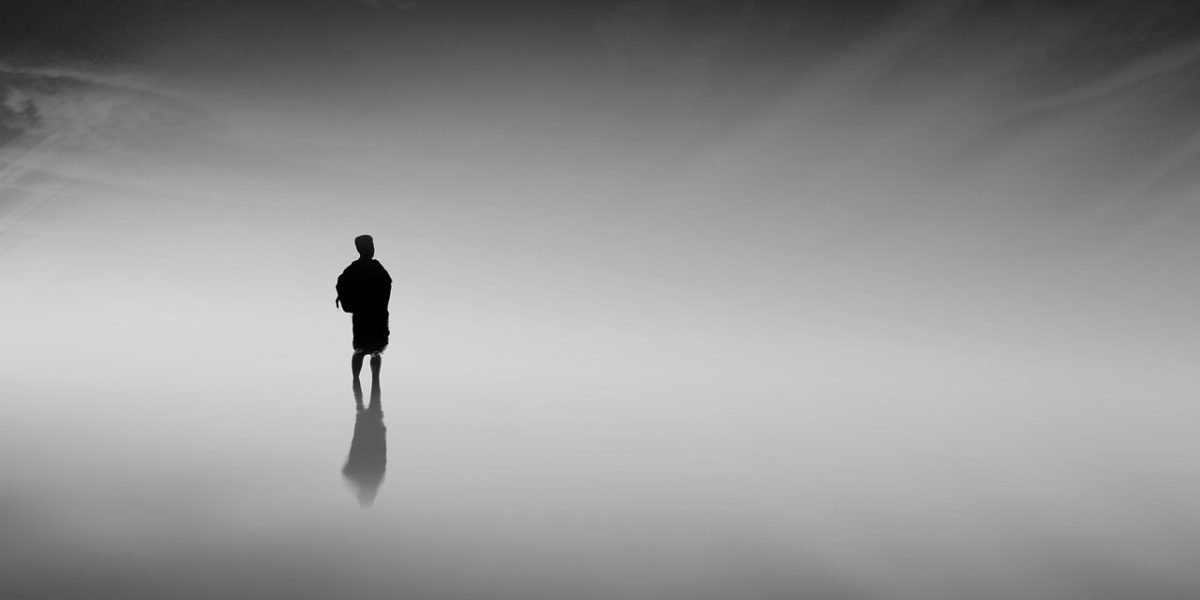 A person engaged in a moment of quiet reflection, emphasizing the importance of daily habits for mental clarity and improved thought content.
